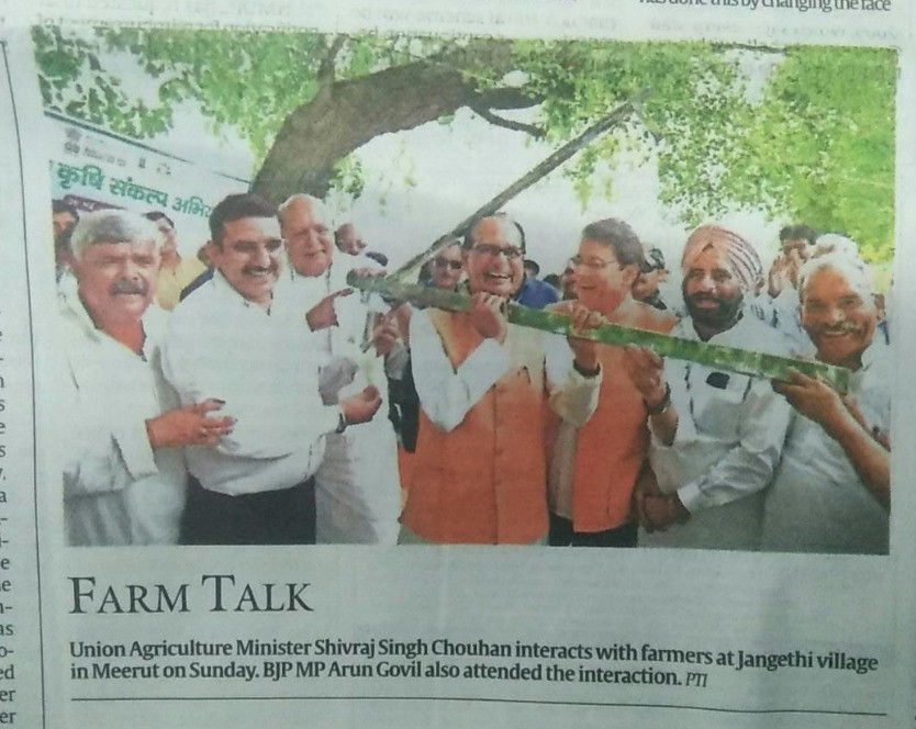 Union Agriculture Minister Shivraj Singh Chouhan interacts with farmers at Jangethi village in Meerut on Sunday. BJP MP Arun Govil also attended the interaction